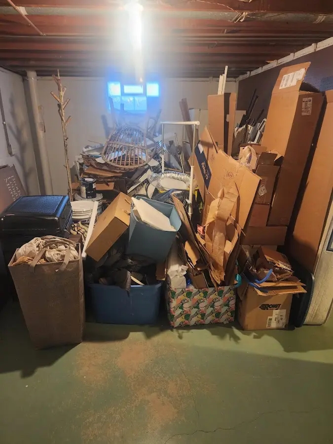 Roll-off dumpster container at job site for 15 Yard Dumpster Rental in Helotes